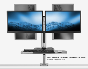the stand up desk converter holding two monitors